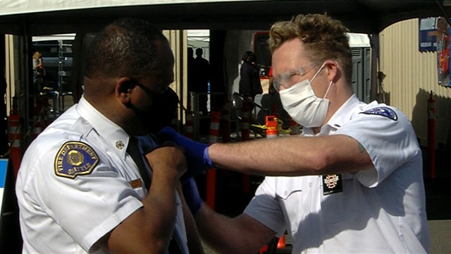 Chief Scoggins receives vaccine, encourages others to get vaccinated on Explore Videos Page Seattle Fire Chief Harold Scoggins receives COVID-19 vaccine