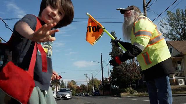 Rain or shine, this crossing guard keeps Seattle’s kids safe with a smile on Explore Videos Page Rain or shine, this crossing guard keeps Seattle’s kids safe with a smile